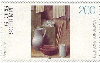 Kitten Beside Milk Pitcher